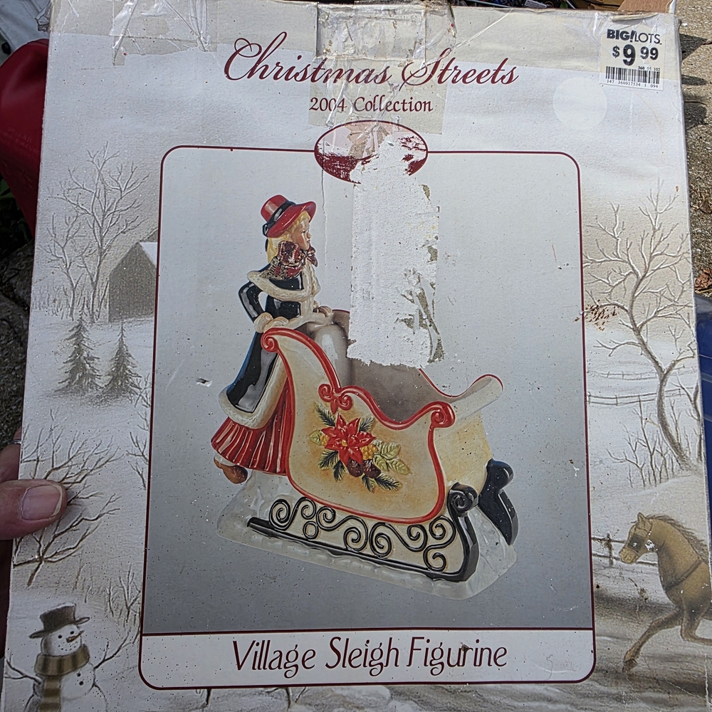 Villager Red and Cream Sleigh Figurine